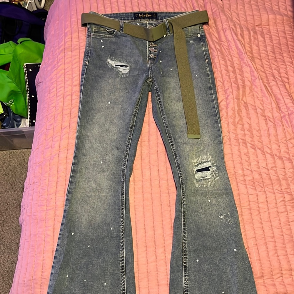 Boot cut jeans few rips in them